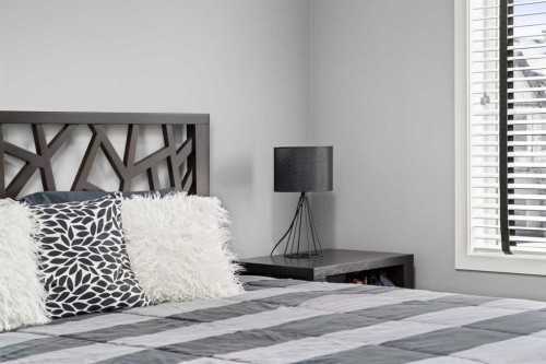 15 Copperpond Landing Se, Calgary, AB - Indoor Photo Showing Bedroom