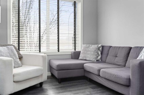 15 Copperpond Landing Se, Calgary, AB - Indoor Photo Showing Living Room