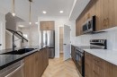 349 Heartwood Park Se, Calgary, AB  - Indoor Photo Showing Kitchen With Upgraded Kitchen 
