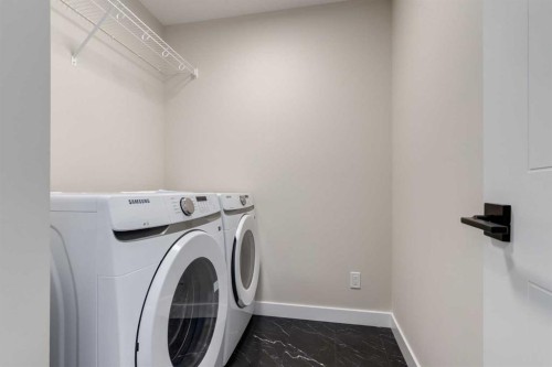 349 Heartwood Park Se, Calgary, AB - Indoor Photo Showing Laundry Room