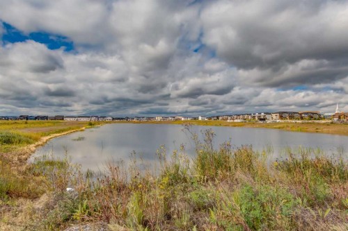 349 Heartwood Park Se, Calgary, AB - Outdoor With Body Of Water With View