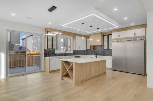 18 South Shore Road, Chestermere, AB - Indoor Photo Showing Kitchen With Upgraded Kitchen