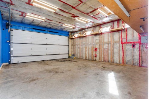 2144 Reunion Square, Airdrie, AB - Indoor Photo Showing Garage