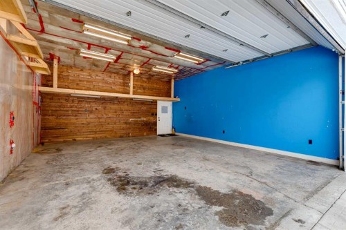 2144 Reunion Square, Airdrie, AB - Indoor Photo Showing Garage