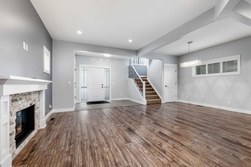 2144 Reunion Square, Airdrie, AB - Indoor With Fireplace
