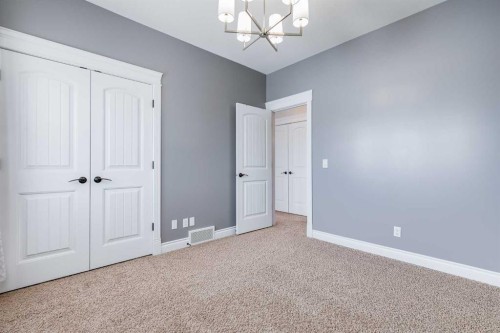 2144 Reunion Square, Airdrie, AB - Indoor Photo Showing Other Room