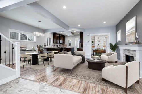 2144 Reunion Square, Airdrie, AB - Indoor Photo Showing Living Room With Fireplace