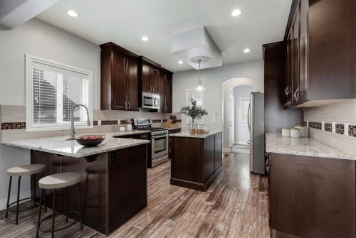 2144 Reunion Square, Airdrie, AB - Indoor Photo Showing Kitchen With Upgraded Kitchen