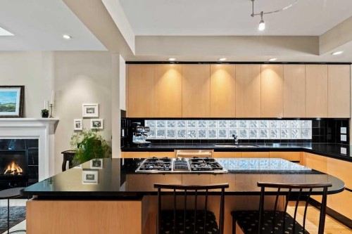 1428 9 Street Nw, Calgary, AB - Indoor Photo Showing Kitchen With Fireplace