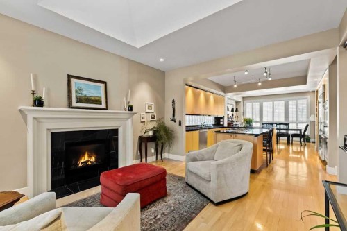 1428 9 Street Nw, Calgary, AB - Indoor Photo Showing Living Room With Fireplace