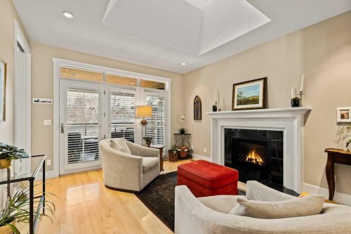 1428 9 Street Nw, Calgary, AB - Indoor Photo Showing Living Room With Fireplace
