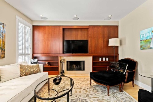 1428 9 Street Nw, Calgary, AB - Indoor Photo Showing Living Room With Fireplace