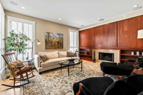 1428 9 Street Nw, Calgary, AB - Indoor Photo Showing Living Room With Fireplace
