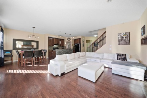 93 Copperleaf Way Se, Calgary, AB - Indoor Photo Showing Living Room