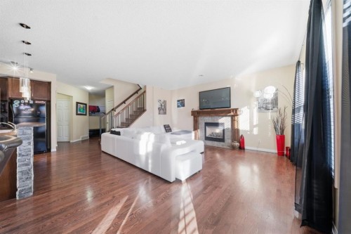 93 Copperleaf Way Se, Calgary, AB - Indoor With Fireplace