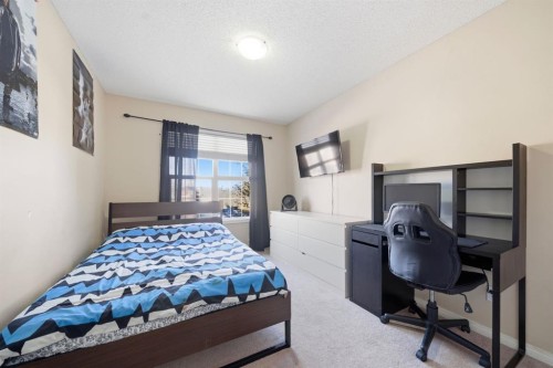 93 Copperleaf Way Se, Calgary, AB - Indoor Photo Showing Bedroom