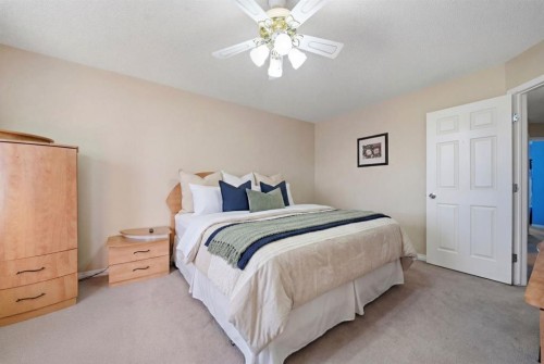 93 Copperleaf Way Se, Calgary, AB - Indoor Photo Showing Bedroom