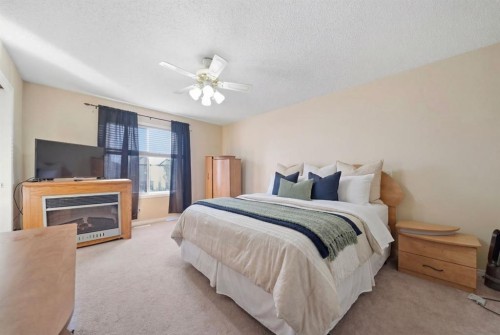 93 Copperleaf Way Se, Calgary, AB - Indoor Photo Showing Bedroom