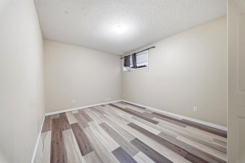 93 Copperleaf Way Se, Calgary, AB - Indoor Photo Showing Other Room