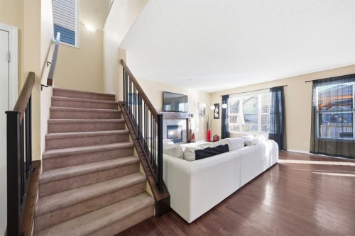 93 Copperleaf Way Se, Calgary, AB - Indoor With Fireplace