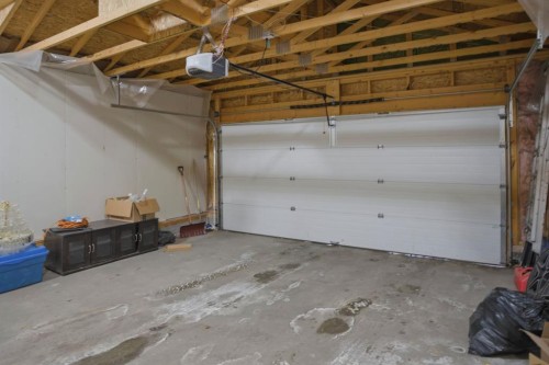 93 Copperleaf Way Se, Calgary, AB - Indoor Photo Showing Garage