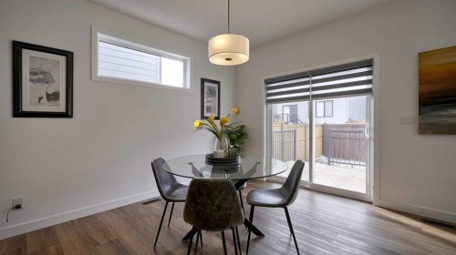57 Willow Green Sw, Airdrie, AB - Indoor Photo Showing Dining Room