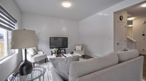 57 Willow Green Sw, Airdrie, AB - Indoor Photo Showing Living Room