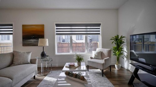 57 Willow Green Sw, Airdrie, AB - Indoor Photo Showing Living Room