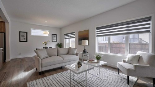 57 Willow Green Sw, Airdrie, AB - Indoor Photo Showing Living Room