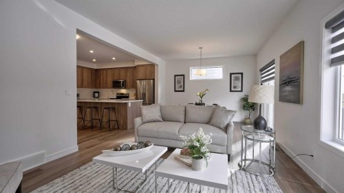 57 Willow Green Sw, Airdrie, AB - Indoor Photo Showing Living Room