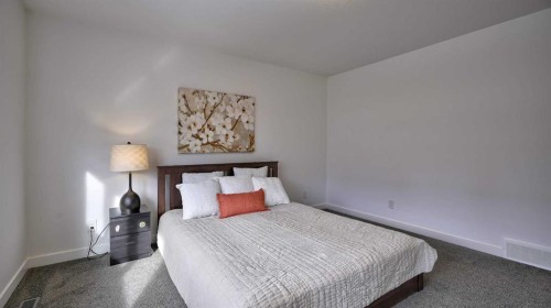 57 Willow Green Sw, Airdrie, AB - Indoor Photo Showing Bedroom
