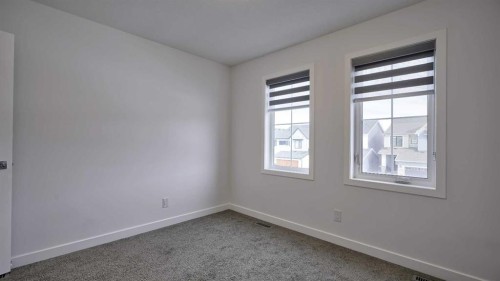 57 Willow Green Sw, Airdrie, AB - Indoor Photo Showing Other Room