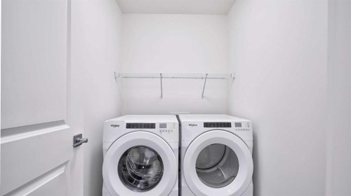 57 Willow Green Sw, Airdrie, AB - Indoor Photo Showing Laundry Room