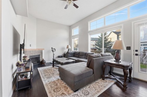 168 Copperfield Court Se, Calgary, AB - Indoor Photo Showing Living Room With Fireplace