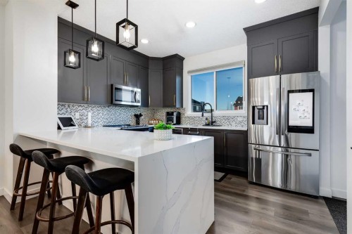 117 Highview Gate Se, Airdrie, AB - Indoor Photo Showing Kitchen With Upgraded Kitchen