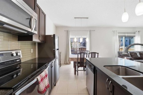 79 Cranford Green Se, Calgary, AB - Indoor Photo Showing Kitchen With Stainless Steel Kitchen