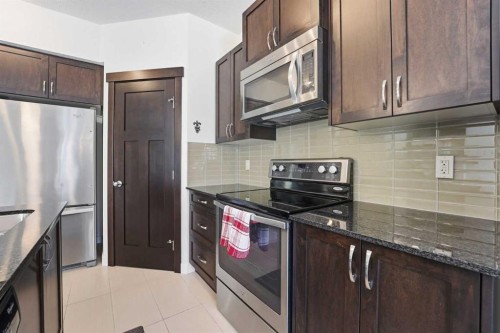 79 Cranford Green Se, Calgary, AB - Indoor Photo Showing Kitchen