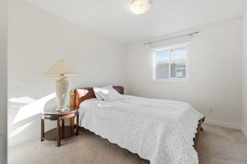 79 Cranford Green Se, Calgary, AB - Indoor Photo Showing Bedroom