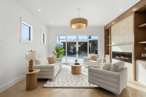 2401 4 Avenue Nw, Calgary, AB - Indoor Photo Showing Living Room With Fireplace