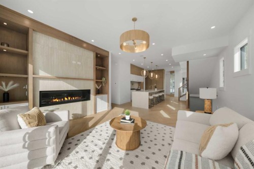 2401 4 Avenue Nw, Calgary, AB - Indoor Photo Showing Living Room With Fireplace