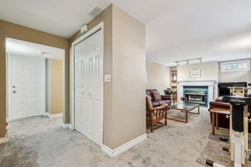 3347 Upton Place Nw, Calgary, AB - Indoor With Fireplace