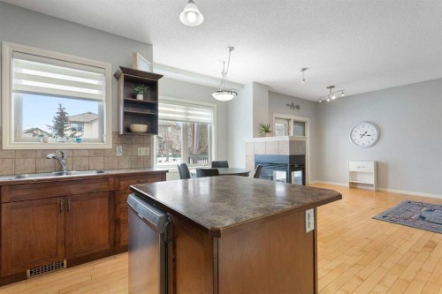 52 Glensummit Close, Cochrane, AB - Indoor Photo Showing Kitchen With Double Sink