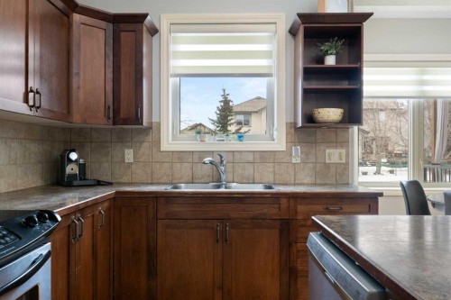 52 Glensummit Close, Cochrane, AB - Indoor Photo Showing Kitchen With Double Sink