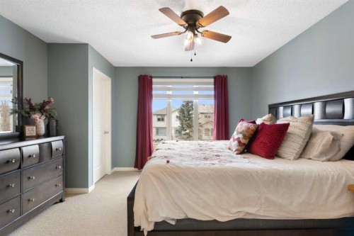 52 Glensummit Close, Cochrane, AB - Indoor Photo Showing Bedroom