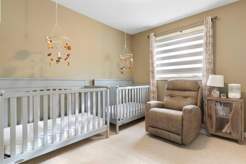 52 Glensummit Close, Cochrane, AB - Indoor Photo Showing Bedroom