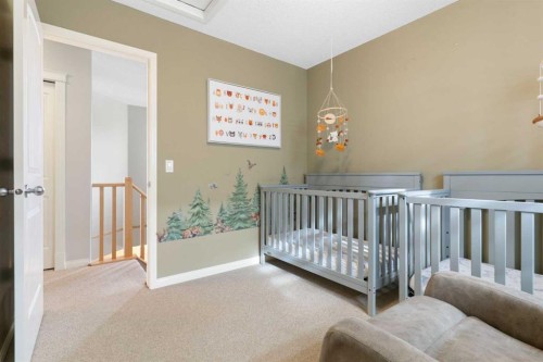 52 Glensummit Close, Cochrane, AB - Indoor Photo Showing Bedroom