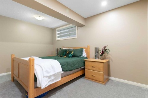 52 Glensummit Close, Cochrane, AB - Indoor Photo Showing Bedroom