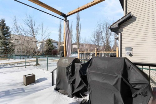 52 Glensummit Close, Cochrane, AB - Outdoor With Deck Patio Veranda With Exterior