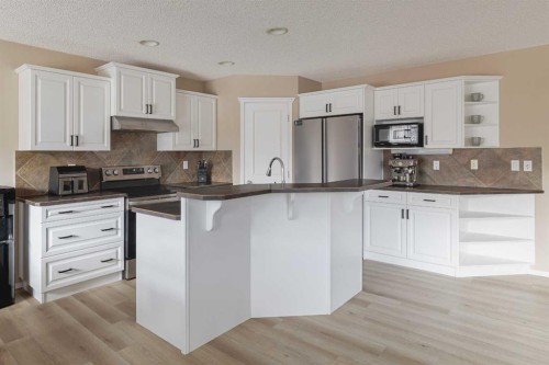 51 Brightondale Crescent Se, Calgary, AB - Indoor Photo Showing Kitchen With Upgraded Kitchen