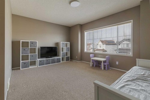 51 Brightondale Crescent Se, Calgary, AB - Indoor Photo Showing Bedroom